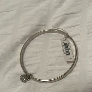 Coach silver bangle bracelet with crystal ball. New w/tag. $34.